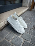 Santoni White Trainer in calf leather